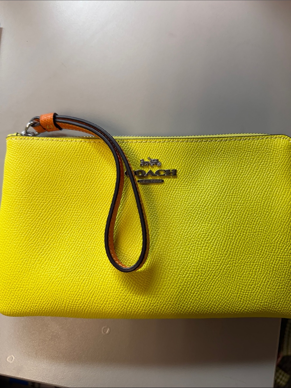 Coach Bright Yellow Leather Wristlet Clutch with Orange Strap Accent